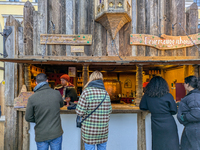 Visitors experience the festive atmosphere of the Medieval Christmas Market in Munich, Bavaria, Germany, on December 6, 2024. The market, lo...