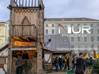 Visitors experience the festive atmosphere of the Medieval Christmas Market in Munich, Bavaria, Germany, on December 6, 2024. The market, lo...