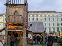 Visitors experience the festive atmosphere of the Medieval Christmas Market in Munich, Bavaria, Germany, on December 6, 2024. The market, lo...