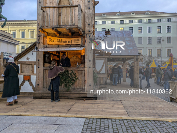 Visitors experience the festive atmosphere of the Medieval Christmas Market in Munich, Bavaria, Germany, on December 6, 2024. The market, lo...