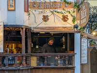 Visitors experience the festive atmosphere of the Medieval Christmas Market in Munich, Bavaria, Germany, on December 6, 2024. The market, lo...