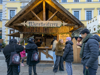 Visitors experience the festive atmosphere of the Medieval Christmas Market in Munich, Bavaria, Germany, on December 6, 2024. The market, lo...