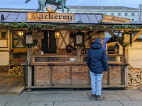 Visitors experience the festive atmosphere of the Medieval Christmas Market in Munich, Bavaria, Germany, on December 6, 2024. The market, lo...