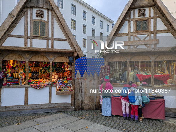 Visitors experience the festive atmosphere of the Medieval Christmas Market in Munich, Bavaria, Germany, on December 6, 2024. The market, lo...