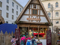 Visitors experience the festive atmosphere of the Medieval Christmas Market in Munich, Bavaria, Germany, on December 6, 2024. The market, lo...