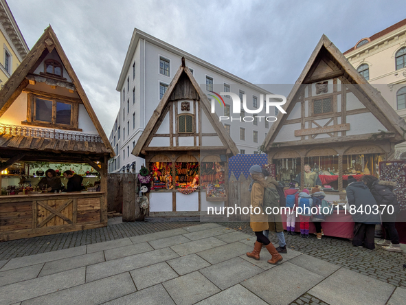 Visitors experience the festive atmosphere of the Medieval Christmas Market in Munich, Bavaria, Germany, on December 6, 2024. The market, lo...