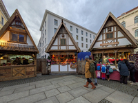 Visitors experience the festive atmosphere of the Medieval Christmas Market in Munich, Bavaria, Germany, on December 6, 2024. The market, lo...