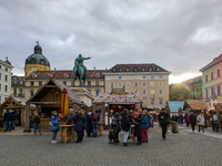 Visitors experience the festive atmosphere of the Medieval Christmas Market in Munich, Bavaria, Germany, on December 6, 2024. The market, lo...