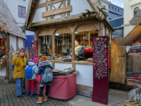 Visitors experience the festive atmosphere of the Medieval Christmas Market in Munich, Bavaria, Germany, on December 6, 2024. The market, lo...