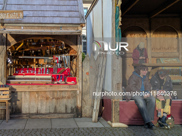 Visitors experience the festive atmosphere of the Medieval Christmas Market in Munich, Bavaria, Germany, on December 6, 2024. The market, lo...