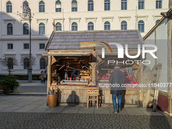 Visitors experience the festive atmosphere of the Medieval Christmas Market in Munich, Bavaria, Germany, on December 6, 2024. The market, lo...