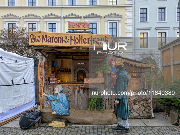 Visitors experience the festive atmosphere of the Medieval Christmas Market in Munich, Bavaria, Germany, on December 6, 2024. The market, lo...