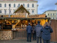 Visitors experience the festive atmosphere of the Medieval Christmas Market in Munich, Bavaria, Germany, on December 6, 2024. The market, lo...