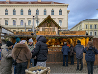 Visitors experience the festive atmosphere of the Medieval Christmas Market in Munich, Bavaria, Germany, on December 6, 2024. The market, lo...