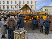 Visitors experience the festive atmosphere of the Medieval Christmas Market in Munich, Bavaria, Germany, on December 6, 2024. The market, lo...