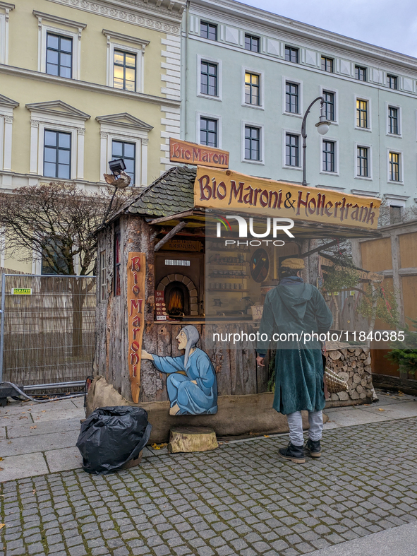 Visitors experience the festive atmosphere of the Medieval Christmas Market in Munich, Bavaria, Germany, on December 6, 2024. The market, lo...