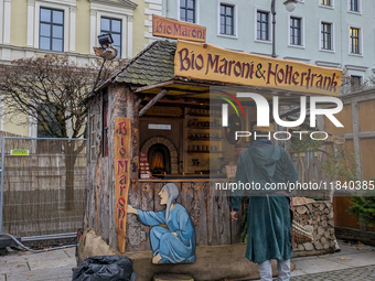 Visitors experience the festive atmosphere of the Medieval Christmas Market in Munich, Bavaria, Germany, on December 6, 2024. The market, lo...