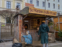 Visitors experience the festive atmosphere of the Medieval Christmas Market in Munich, Bavaria, Germany, on December 6, 2024. The market, lo...