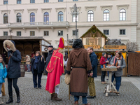 Visitors experience the festive atmosphere of the Medieval Christmas Market in Munich, Bavaria, Germany, on December 6, 2024. The market, lo...