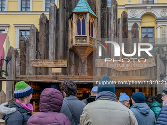 Visitors experience the festive atmosphere of the Medieval Christmas Market in Munich, Bavaria, Germany, on December 6, 2024. The market, lo...