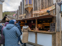 Visitors experience the festive atmosphere of the Medieval Christmas Market in Munich, Bavaria, Germany, on December 6, 2024. The market, lo...