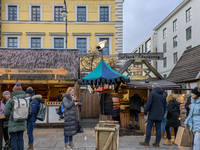 Visitors experience the festive atmosphere of the Medieval Christmas Market in Munich, Bavaria, Germany, on December 6, 2024. The market, lo...