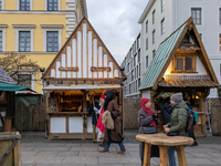 Visitors experience the festive atmosphere of the Medieval Christmas Market in Munich, Bavaria, Germany, on December 6, 2024. The market, lo...