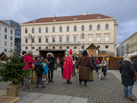 Visitors experience the festive atmosphere of the Medieval Christmas Market in Munich, Bavaria, Germany, on December 6, 2024. The market, lo...