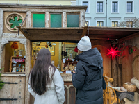 Visitors experience the festive atmosphere of the Medieval Christmas Market in Munich, Bavaria, Germany, on December 6, 2024. The market, lo...