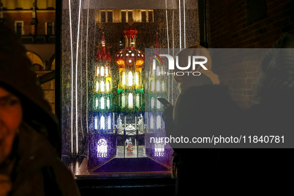 Nativity scene is seen on the Main Square as Christmas decorations become present in Krakow, Poland on October 6, 2024. Krakow has a long an...