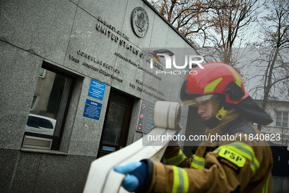 Police, city guards and fire services exercise emergency drills at the US embassy in Warsaw, Poland on 06 December, 2024. Emergency services...