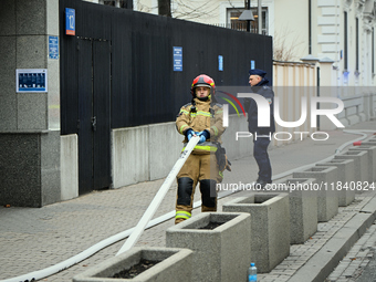 Police, city guards and fire services exercise emergency drills at the US embassy in Warsaw, Poland on 06 December, 2024. Emergency services...