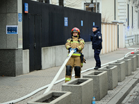 Police, city guards and fire services exercise emergency drills at the US embassy in Warsaw, Poland on 06 December, 2024. Emergency services...