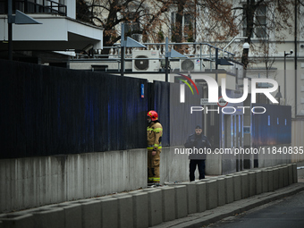 Police, city guards and fire services exercise emergency drills at the US embassy in Warsaw, Poland on 06 December, 2024. Emergency services...