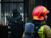 Police, city guards and fire services exercise emergency drills at the US embassy in Warsaw, Poland on 06 December, 2024. Emergency services...