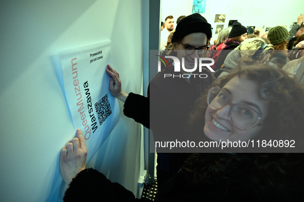 Visitors attend the opening of the country’s first queer museum in Warsaw, Poland on 06 December, 2024. The QueeMuzeum is a cultural space t...