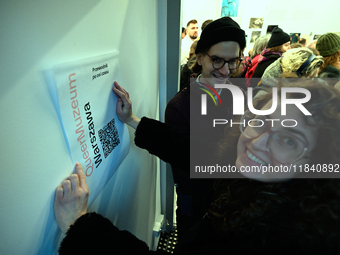 Visitors attend the opening of the country’s first queer museum in Warsaw, Poland on 06 December, 2024. The QueeMuzeum is a cultural space t...