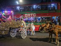 City dwellers ride on a horse cart during a public holiday in Dhaka, Bangladesh, on December 6, 2024. Horse cart rides, a nostalgic mode of...