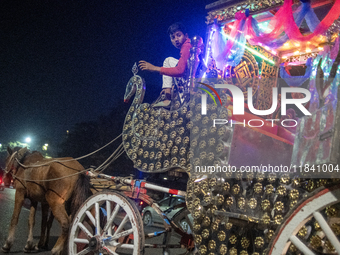 A boy waits with his horse cart and calls for passengers during a public holiday in Dhaka, Bangladesh, on December 6, 2024. Horse carts rema...