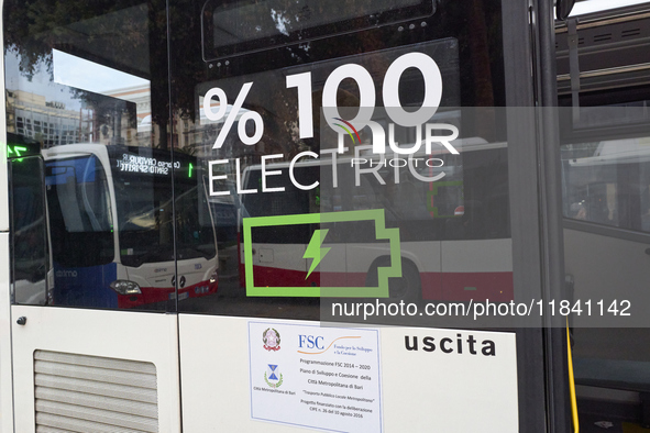 An image shows a fully electric bus operating in the city of Bari, Italy, on December 2, 2024. 