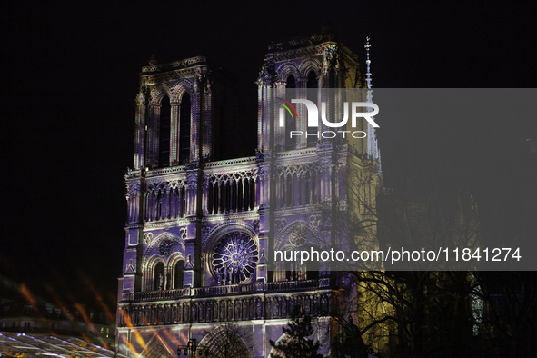 The inauguration ceremony takes place in the evening at Notre Dame Cathedral in Paris, France, on Ile de la Cite. The facade of this histori...