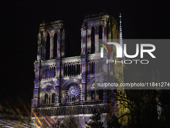 The inauguration ceremony takes place in the evening at Notre Dame Cathedral in Paris, France, on Ile de la Cite. The facade of this histori...