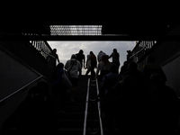 Backlight of people leaving the Zocalo subway in Mexico City, Mexico, on December 6, 2024. (