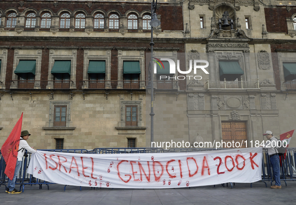 Palestinian activists and supporters demonstrate against the genocide in Gaza in the Zocalo of Mexico City, Mexico, on December 6, 2024, to...