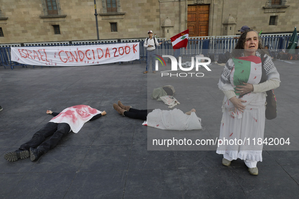 Palestinian activists and supporters demonstrate against the genocide in Gaza in the Zocalo of Mexico City, Mexico, on December 6, 2024, to...