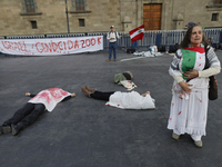 Palestinian activists and supporters demonstrate against the genocide in Gaza in the Zocalo of Mexico City, Mexico, on December 6, 2024, to...