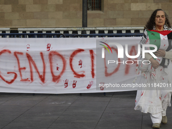 Palestinian activists and supporters demonstrate against the genocide in Gaza in the Zocalo of Mexico City, Mexico, on December 6, 2024, to...