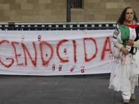 Palestinian activists and supporters demonstrate against the genocide in Gaza in the Zocalo of Mexico City, Mexico, on December 6, 2024, to...