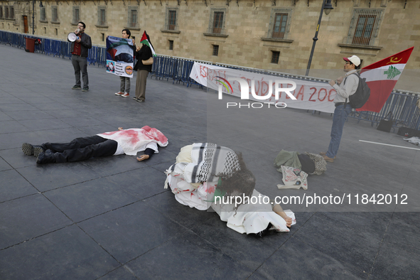 Palestinian activists and supporters demonstrate against the genocide in Gaza in the Zocalo of Mexico City, Mexico, on December 6, 2024, to...