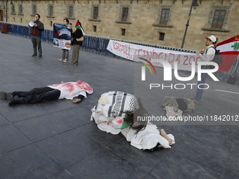 Palestinian activists and supporters demonstrate against the genocide in Gaza in the Zocalo of Mexico City, Mexico, on December 6, 2024, to...